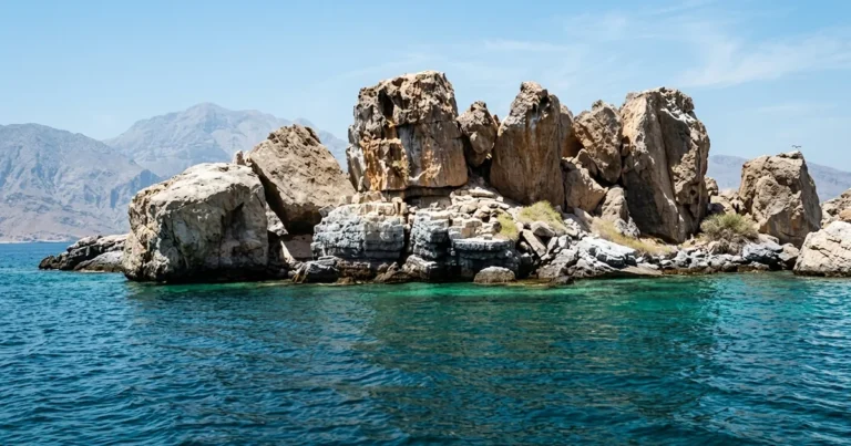Dive Lima Rock in Musandam, a limestone pinnacle guarding Lima Bay in Musandam, Oman. Coral walls and rich marine life for certified divers. Book now.