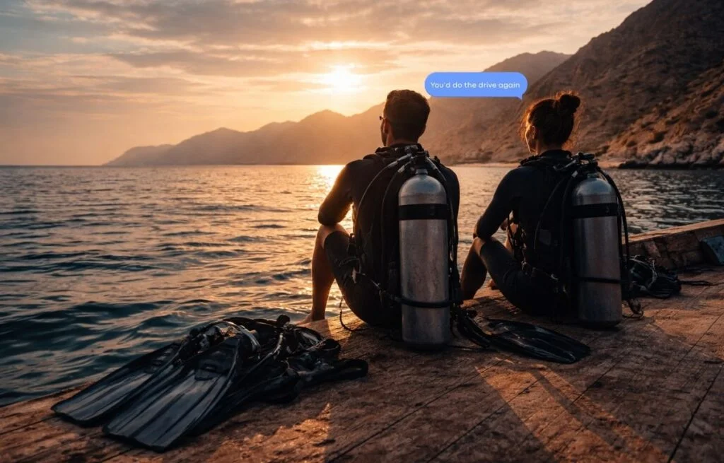 After a scuba diving trip in Dibba, divers rest on a boat at sunset, reflecting on one of the best dive experiences in Fujairah.